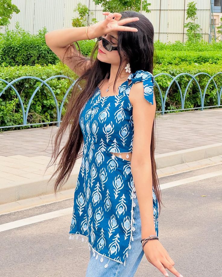 Trendy Blue Printed Sleeveless Kurti Top