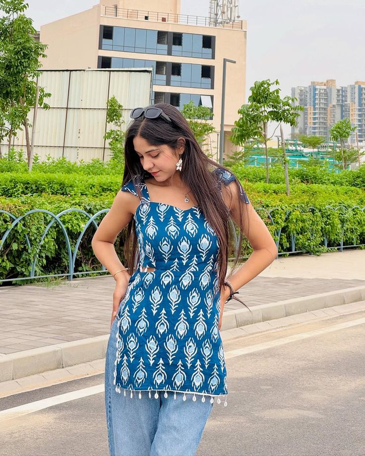 Trendy Blue Printed Sleeveless Kurti Top